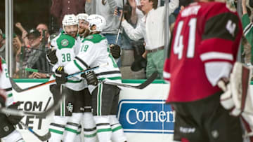Mar 31, 2016; Dallas, TX, USA; Dallas Stars center Vernon Fiddler (38) and defenseman Alex Goligoski (33) and right wing Patrick Eaves (18) celebrate Eaves