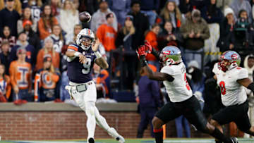 Auburn footballNov 19, 2022; Auburn, Alabama, USA; Auburn Tigers quarterback Robby Ashford (9) shows a pass during the second quarter against the Western Kentucky Hilltoppers at Jordan-Hare Stadium. Mandatory Credit: John Reed-USA TODAY Sports