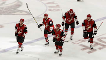 GLENDALE, AZ - OCTOBER 10: The Arizona Coyotes celebrate after a goal during the NHL hockey game between the Vegas Golden Knights and the Arizona Coyotes on October 10, 2019 at Gila River Arena in Glendale, Arizona. (Photo by Kevin Abele/Icon Sportswire via Getty Images)
