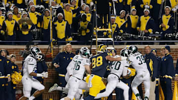 ANN ARBOR, MI - OCTOBER 17: Defensive back Jalen Watts-Jackson #20 of the Michigan State Spartans runs the football into to end zone for the game winning touchdown against the Michigan Wolverines during the final seconds of college football game at Michigan Stadium on October 17, 2015 in Ann Arbor, Michigan. The Spartans defeated the Wolverines 27-23. (Photo by Christian Petersen/Getty Images)