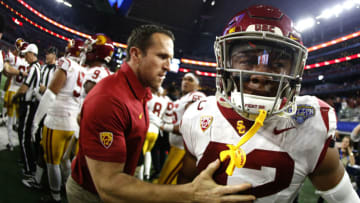 ARLINGTON, TX - DECEMBER 29: Uchenna Nwosu #42 of the USC Trojans looks on after participating in a skirmish in the second half of the 82nd Goodyear Cotton Bowl Classic between USC and Ohio State at AT&T Stadium on December 29, 2017 in Arlington, Texas. Ohio State won 24-7. (Photo by Ron Jenkins/Getty Images)
