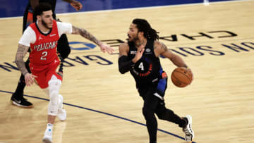 Lonzo Ball, Derrick Rose Mandatory Credit: Adam Hunger/POOL PHOTOS-USA TODAY Sports