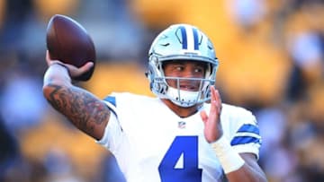 Nov 13, 2016; Pittsburgh, PA, USA; Dallas Cowboys quarterback Dak Prescott (4) warms up before playing the Pittsburgh Steelers at Heinz Field. Mandatory Credit: Charles LeClaire-USA TODAY Sports