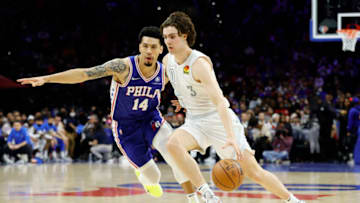 Josh Giddey #3 of the OKC Thunder dribbles past Danny Green. (Photo by Tim Nwachukwu/Getty Images)