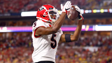 Adonai Mitchell reacts after scoring a touchdown against the Michigan Wolverines in the Capital One Orange Bowl. (Photo by Michael Reaves/Getty Images)