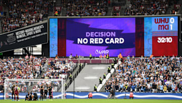 LONDON, ENGLAND - AUGUST 10: The VAR screen shows that a VAR review has led to no red card being awarded during the Premier League match between West Ham United and Manchester City at London Stadium on August 10, 2019 in London, United Kingdom. (Photo by Shaun Botterill/Getty Images)