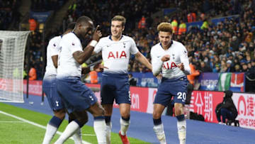 Tottenham Hotspur's English midfielder Dele Alli (R) celebrates with Tottenham Hotspur's English midfielder Harry Winks (C) and Tottenham Hotspur's French midfielder Moussa Sissoko after scoring during the English Premier League football match between Leicester City and Tottenham Hotspur at the King Power Stadium in Leicester, central England on December 8, 2018. (Photo by Oli SCARFF / AFP) / RESTRICTED TO EDITORIAL USE. No use with unauthorized audio, video, data, fixture lists, club/league logos or 'live' services. Online in-match use limited to 120 images. An additional 40 images may be used in extra time. No video emulation. Social media in-match use limited to 120 images. An additional 40 images may be used in extra time. No use in betting publications, games or single club/league/player publications. / (Photo credit should read OLI SCARFF/AFP/Getty Images)