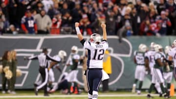 Nov 27, 2016; East Rutherford, NJ, USA; New England Patriots quarterback Tom Brady (12) reacts against the New York Jets during the fourth quarter at MetLife Stadium. Mandatory Credit: Brad Penner-USA TODAY Sports