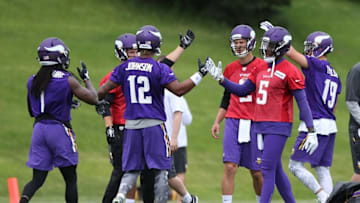 Jun 15, 2016; Minneapolis, MN, USA; Minnesota Vikings quarterback Teddy Bridgewater (5) high fives Vikings wide receiver Charles Johnson (12) during mini camp. Mandatory Credit: Brad Rempel-USA TODAY Sports