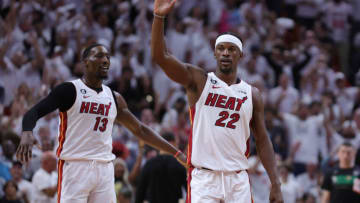 MIAMI, FLORIDA - MAY 21: Jimmy Butler #22 and Bam Adebayo #13 of the Miami Heat react during the third quarter against the Boston Celtics in game three of the Eastern Conference Finals at Kaseya Center on May 21, 2023 in Miami, Florida. NOTE TO USER: User expressly acknowledges and agrees that, by downloading and or using this photograph, User is consenting to the terms and conditions of the Getty Images License Agreement. (Photo by Megan Briggs/Getty Images)