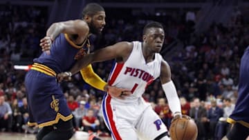 Apr 24, 2016; Auburn Hills, MI, USA; Detroit Pistons guard Reggie Jackson (1) dribbles by Cleveland Cavaliers guard Kyrie Irving (2) during the second quarter in game four of the first round of the NBA Playoffs at The Palace of Auburn Hills. Mandatory Credit: Raj Mehta-USA TODAY Sports