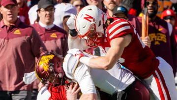 Minnesota Golden Gophers quarterback Athan Kaliakmanis (8) drives with the ball against Nebraska football defenders during the third quarter at Memorial Stadium. (Dylan Widger-USA TODAY Sports)