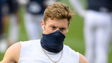 Nov 21, 2020; University Park, Pennsylvania, USA; Penn State Nittany Lions quarterback Will Levis (7) warms up while wearing a mask prior to the game against the Iowa Hawkeyes at Beaver Stadium. Mandatory Credit: Rich Barnes-USA TODAY Sports