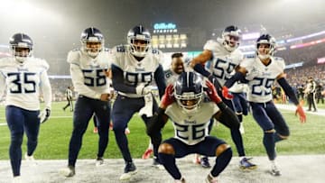 FOXBOROUGH, MASSACHUSETTS - JANUARY 04: Logan Ryan #26 of the Tennessee Titans celebrates his touchdown with teammates against the New England Patriots in the fourth quarter of the AFC Wild Card Playoff game at Gillette Stadium on January 04, 2020 in Foxborough, Massachusetts. (Photo by Kathryn Riley/Getty Images)