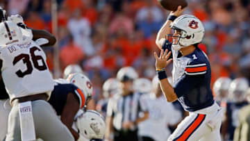 AUBURN, ALABAMA - OCTOBER 28: Payton Thorne #1 of the Auburn Tigers passes the football over Mississippi State Bulldogs defense during the second quarter at Jordan-Hare Stadium on October 28, 2023 in Auburn, Alabama. (Photo by Alex Slitz/Getty Images)