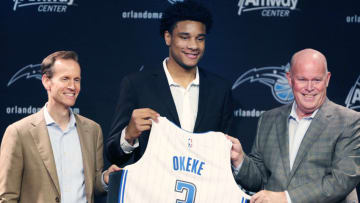 Chuma Okeke, middle, is introduced as the Orlando Magic's top 2019 draft pick during a news conference at the Amway Center in Orlando, Fla., on Friday, June 21, 2019. At left is Orlando Magic general manager Jeff Weltman, and at right is head coach Steve Clifford. (Stephen M. Dowell/Orlando Sentinel/TNS via Getty Images)