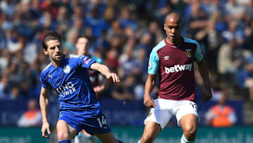 LEICESTER, ENGLAND - MAY 05: Adrien Silva of Leaicester City puts pressure on Joao Mario of West Ham United during the Premier League match between Leicester City and West Ham United at The King Power Stadium on May 5, 2018 in Leicester, England. (Photo by Michael Regan/Getty Images)
