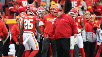 KANSAS CITY, MO - DECEMBER 29: Kansas City Chiefs head coach Andy Reid congratulates running back Damien Williams (26) after Williams 7-yard touchdown run late in the fourth quarter of an AFC West game between the Los Angeles Chargers and Kansas City Chiefs on December 29, 2019 at Arrowhead Stadium in Kansas City, MO. (Photo by Scott Winters/Icon Sportswire via Getty Images)