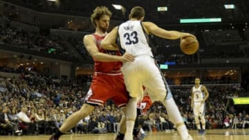 Dec 19, 2014; Memphis, TN, USA; Chicago Bulls forward Pau Gasol (16) guards Memphis Grizzlies center Marc Gasol (33) during the game at FedExForum. Mandatory Credit: Justin Ford-USA TODAY Sports