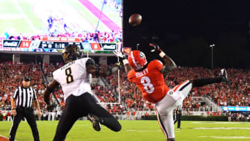 ATHENS, GA - OCTOBER 6: Riley Ridley #8 of the Georgia Bulldogs makes a catch for a second quarter touchdown against Joejuan Williams #8 of the Vanderbilt Commodores on October 6, 2018 at Sanford Stadium in Athens, Georgia. (Photo by Scott Cunningham/Getty Images)