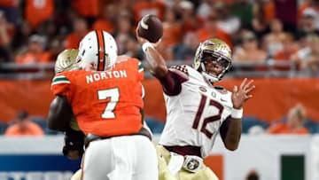 Oct 8, 2016; Miami Gardens, FL, USA; Florida State Seminoles quarterback Deondre Francois (12) throws a pass during the first half against Miami Hurricanes at Hard Rock Stadium. Mandatory Credit: Steve Mitchell-USA TODAY Sports