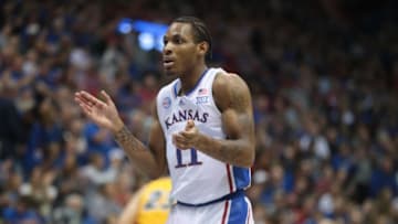 Kansas freshman guard MJ Rice (11) claps after getting a lay up in the first half of Thursday's game against North Dakota State inside Allen Fieldhouse.