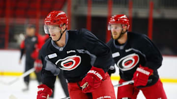 Sept 18, 2015; Raleigh, NC, USA; Carolina Hurricanes defensemen Noah Hanifin (5) skates during training camp at PNC Arena. Mandatory Credit: James Guillory-USA TODAY Sports