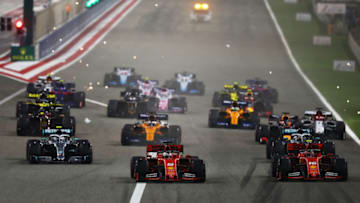 BAHRAIN, BAHRAIN - MARCH 31: Sebastian Vettel of Germany driving the (5) Scuderia Ferrari SF90 battles for position with Charles Leclerc of Monaco driving the (16) Scuderia Ferrari SF90 at the start during the F1 Grand Prix of Bahrain at Bahrain International Circuit on March 31, 2019 in Bahrain, Bahrain. (Photo by Lars Baron/Getty Images)