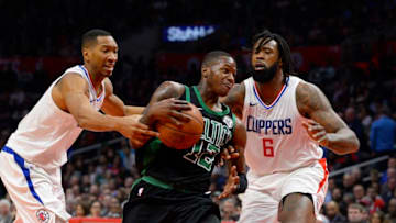 LOS ANGELES, CA - JANUARY 24: Terry Rozier #12 of the Boston Celtics plays against Wesley Johnson #33 and DeAndre Jordan #6 of the Los Angeles Clippers on January 24, 2018 at STAPLES Center in Los Angeles, California. NOTE TO USER: User expressly acknowledges and agrees that, by downloading and or using this photograph, User is consenting to the terms and conditions of the Getty Images License Agreement. (Photo by Robert Laberge/Getty Images)