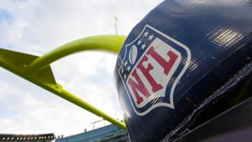 Aug 18, 2016; Green Bay, WI, USA; The NFL logo on goalpost padding prior to the game between the Oakland Raiders and Green Bay Packers at Lambeau Field. Green Bay won 20-12. Mandatory Credit: Jeff Hanisch-USA TODAY Sports