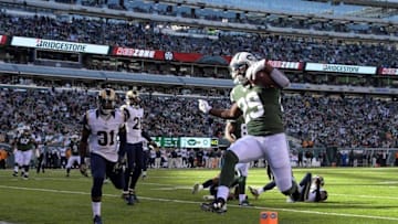 Nov 13, 2016; East Rutherford, NJ, USA; New York Jets running back Bilal Powell (29) scores on a four-yard touchdown pass in the second quarter against the Los Angeles Rams at MetLife Stadium. Mandatory Credit: Kirby Lee-USA TODAY Sports