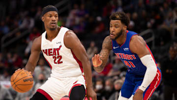 Miami Heat forward Jimmy Butler (22) gets defended by Detroit Pistons forward Saddiq Bey Credit: Raj Mehta-USA TODAY Sports