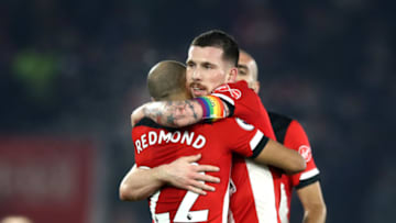 SOUTHAMPTON, ENGLAND - DECEMBER 04: Pierre-Emile Hojbjerg of Southampton celebrates with teammate Nathan Redmond at full-time after the Premier League match between Southampton FC and Norwich City at St Mary's Stadium on December 04, 2019 in Southampton, United Kingdom. (Photo by Bryn Lennon/Getty Images)