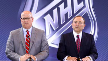 Deputy NHL Commissioner Bill Daly and commissioner Gary Bettman. (Photo by Bruce Bennett/Getty Images)