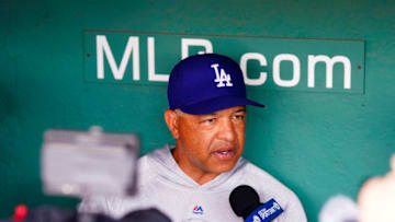 BOSTON, MASSACHUSETTS - JULY 12: Manager Dave Roberts #30 of the Los Angeles Dodgers gives an interview before the game against the Boston Red Sox at Fenway Park on July 12, 2019 in Boston, Massachusetts. (Photo by Omar Rawlings/Getty Images)