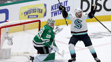 DALLAS, TEXAS - MAY 02: Oliver Bjorkstrand #22 of the Seattle Kraken celebrates after Yanni Gourde #37 of the Seattle Kraken scored the game-winning goal against Jake Oettinger #29 of the Dallas Stars in the first overtime period in Game One of the Second Round of the 2023 Stanley Cup Playoffs at American Airlines Center on May 02, 2023 in Dallas, Texas. (Photo by Tom Pennington/Getty Images)