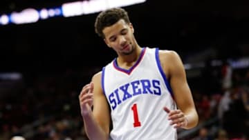 Nov 29, 2014; Philadelphia, PA, USA; Philadelphia 76ers guard Michael Carter-Williams (1) reacts as time winds down during the second half of a game against the Dallas Mavericks at Wells Fargo Center. The Mavericks defeated the 76ers 110-103. Mandatory Credit: Bill Streicher-USA TODAY Sports