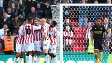 STOKE ON TRENT, ENGLAND - OCTOBER 08: Phil Jagielka of Stoke City celebrates with his teammates after he scores their second goal during the Sky Bet Championship between Stoke City and Sheffield United at Bet365 Stadium on October 08, 2022 in Stoke on Trent, England. (Photo by Nathan Stirk/Getty Images)