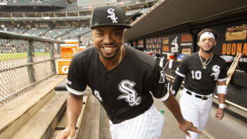 CHICAGO - SEPTEMBER 11: Eloy Jimenez #74 and Yoan Moncada #10 of the Chicago White Sox look on from the dugout prior to the game against the Kansas City Royals on September 11, 2019 at Guaranteed Rate Field in Chicago, Illinois. (Photo by Ron Vesely/MLB Photos via Getty Images)