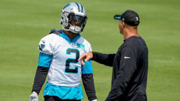 Jun 8, 2022; Charlotte, North Carolina, USA; Carolina Panthers receiver D.J. Moore talks with receivers coach Joe Dailey during Carolina Panthers minicamp at Bank of America Stadium Practice Facility. Mandatory Credit: Jim Dedmon-USA TODAY Sports