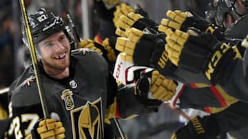LAS VEGAS, NV - DECEMBER 19: Shea Theodore #27 of the Vegas Golden Knights celebrates with teammates after scoring on a power-play goal with 2.3 seconds left in the third period to beat the Tampa Bay Lightning 4-3 at T-Mobile Arena on December 19, 2017 in Las Vegas, Nevada. (Photo by Ethan Miller/Getty Images)