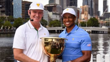 International team captain Ernie Els of South Africa (L) and Tiger Woods, captain of the US team (R) hold the Presidents Cup trophy in Melbourne on December 9, 2019. - The Presidents Cup is to be played at the Royal Melbourne Colf Club from December 12-15. (Photo by William WEST / AFP) / -- IMAGE RESTRICTED TO EDITORIAL USE - STRICTLY NO COMMERCIAL USE -- (Photo by WILLIAM WEST/AFP via Getty Images)
