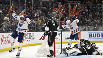 Apr 4, 2023; Los Angeles, California, USA; Edmonton Oilers left wing Zach Hyman (18) celebrates after center Leon Draisaitl (29) scored a goal past Los Angeles Kings goaltender Pheonix Copley (29) in the third period at Crypto.com Arena. Mandatory Credit: Jayne Kamin-Oncea-USA TODAY Sports