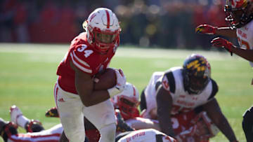 Nov 19, 2016; Lincoln, NE, USA; Nebraska Cornhuskers running back Terrell Newby (34) drives to the goal line against the Maryland Terrapins in the second half at Memorial Stadium. Nebraska won 28-7. Mandatory Credit: Bruce Thorson-USA TODAY Sports