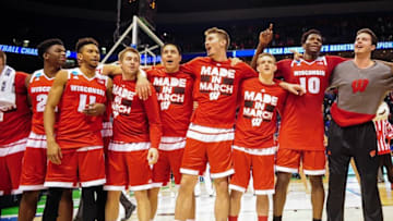 Mar 20, 2016; St. Louis, MO, USA; Wisconsin Badgers team members celebrate after the game against the Xavier Musketeers the second round in the 2016 NCAA Tournament at Scottrade Center. Wisconsin won 66-63. Mandatory Credit: Jeff Curry-USA TODAY Sports