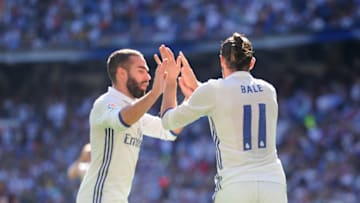 MADRID, SPAIN - OCTOBER 02: Gareth Bale of Real Madrid celebrates with Dani Carvajal after scoring Real's opening goal during the La Liga Match between Real Madrid CF and SD Eibar at estadio Santiago Bernabeu on October 2, 2016 in Madrid, Spain. (Photo by Denis Doyle/Getty Images)