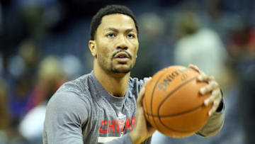 Apr 5, 2016; Memphis, TN, USA; Chicago Bulls guard Derrick Rose shoots prior to the game against the Memphis Grizzlies at FedExForum. Mandatory Credit: Nelson Chenault-USA TODAY Sports