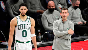 NEW YORK, NEW YORK - JUNE 01: Jayson Tatum #0 and head coach Brad Stevens of the Boston Celtics looks on against the Brooklyn Nets in Game Five of the First Round of the 2021 NBA Playoffs at Barclays Center on June 01, 2021 in the Brooklyn borough of New York City. NOTE TO USER: User expressly acknowledges and agrees that, by downloading and or using this photograph, User is consenting to the terms and conditions of the Getty Images License Agreement. (Photo by Steven Ryan/Getty Images)