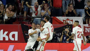 Sevilla's Portuguese forward Andre Silva (C) celebrates after scoring a goal during the Spanish league football match Sevilla FC against Real Madrid CF at the Ramon Sanchez Pizjuan stadium in Seville on September 26, 2018. (Photo by CRISTINA QUICLER / AFP) (Photo credit should read CRISTINA QUICLER/AFP/Getty Images)