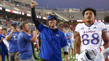 Sep 17, 2022; Houston, Texas, USA; Kansas Jayhawks tight end Tevita Noa (88) and coaches celebrate after the Jayhawks defeated the Houston Cougars at TDECU Stadium. Mandatory Credit: Troy Taormina-USA TODAY Sports